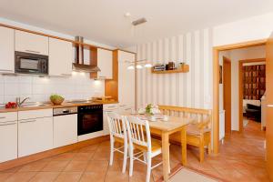 Η κουζίνα ή μικρή κουζίνα στο FeWo 43 1, Heideweg 3 a +4 φωτογραφίες