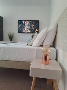 Postel nebo postele na pokoji v ubytování StudiOasis