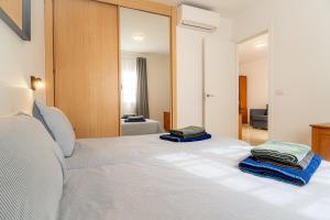 Las Casitas de Corralejo客房内的一张或多张床位