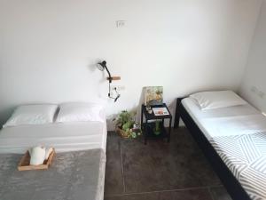 A bed or beds in a room at Imagine hostel