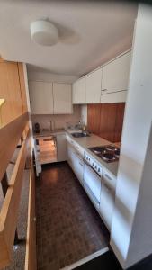 Köök või kööginurk majutusasutuses Residenza Tga Clo Apartment C20