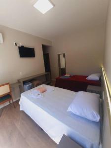 TV a/nebo společenská místnost v ubytování Casa das Palmeiras 2