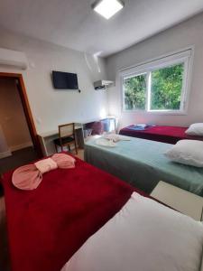 Postel nebo postele na pokoji v ubytování Casa das Palmeiras 2