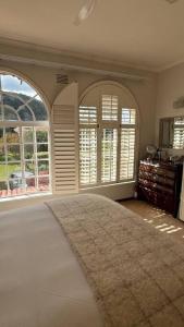 Giường trong phòng chung tại 2 The Villas