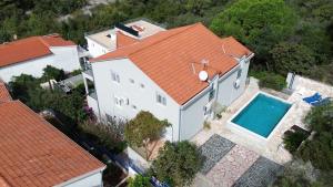 an overhead view of a house with a swimming pool at Villa Knez in Trogir