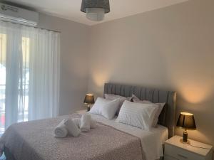Ένα ή περισσότερα κρεβάτια σε δωμάτιο στο Vicky's view house