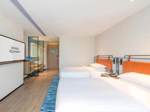 Kép Echarm Hotel Guangzhou Baiyun Airport Huadu Plaza Branch szállásáról Huatuban a galériában