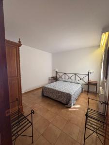 Łóżko lub łóżka w pokoju w obiekcie El Domingo en el Valle