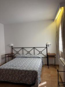 Łóżko lub łóżka w pokoju w obiekcie El Domingo en el Valle