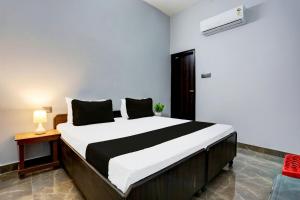 Postel nebo postele na pokoji v ubytování Super Hotel Live View