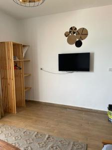TV a/nebo společenská místnost v ubytování hakuna matata
