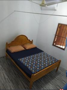 Postel nebo postele na pokoji v ubytování Joes Resthouse