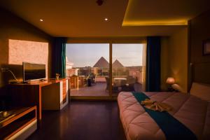 Posezení v ubytování Top pyramids view hotel + 85 fotografií