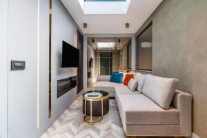 TV a/nebo společenská místnost v ubytování Lexia Hotels