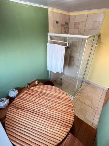 Postel nebo postele na pokoji v ubytování Loft Pucci com ofurô