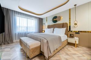 Postel nebo postele na pokoji v ubytování Lexia Hotels