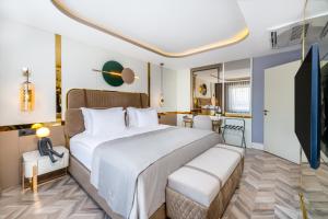 Postel nebo postele na pokoji v ubytování Lexia Hotels