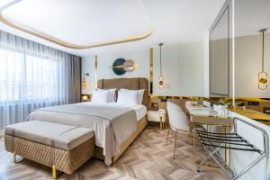 Postel nebo postele na pokoji v ubytování Lexia Hotels