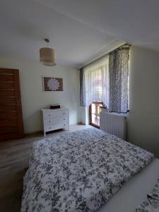 Letto o letti in una camera di Domek na Leśnej Wisła