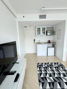 Kuchyň nebo kuchyňský kout v ubytování M N Flats Apartamento Dentro Do Hotel Av Ibirapuera 2534