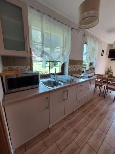 Cucina o angolo cottura di Domek na Leśnej Wisła