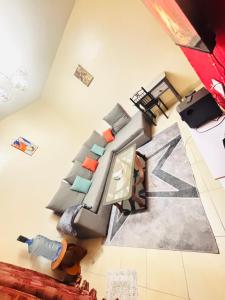 Posezení v ubytování Cosy one bedroom at TRM Drive