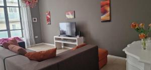 TV o dispositivi per l'intrattenimento presso PACEVILLE St Julians Apartments