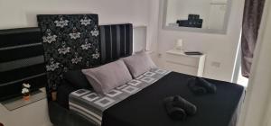 Letto o letti in una camera di PACEVILLE St Julians Apartments