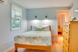 a bedroom with a bed and a window at half Mi to Ogunquit Beach Maine Home with Deck! in Ogunquit