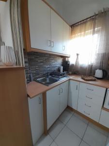 Gallery image of AGGELIKI STUDIOS 1 in Agios Georgios +37 photos