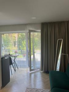 Balkón nebo terasa v ubytování Kulautuva Park Apartments