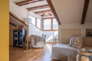 A bed or beds in a room at Loft 38 Ioannina