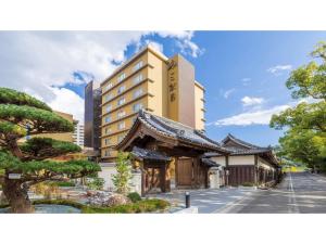a hotel with a building in front of it at Sansuien - Vacation STAY 06800v in Kochi