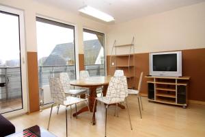 Μια τηλεόραση ή/και κέντρο ψυχαγωγίας στο Ferienhaus in Neukirchen nahe Sylt Strand