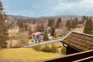a view of a house in the middle of a field at Ferienhaus im Kurort inkl Frühstück in Goslar