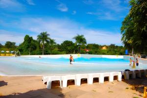 A piscina localizada em Spazzio Diroma Com acesso gratuíto ao Acqua Park - D ou nos arredores
