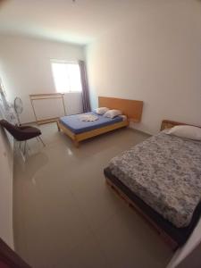 Postel nebo postele na pokoji v ubytování Casa Ismael