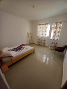 Postel nebo postele na pokoji v ubytování Casa Ismael