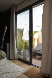 Setusvæði á Gîte Studio Alsa 15 avec Jacuzzi privatif