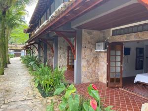 Foto da galeria de Pousada Passeio Brig Maresias em Maresias