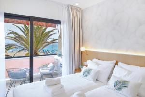 Una cama o camas en una habitación de TMS Veramar Apart Hotel,Beachfront,Pool&Parking 27 fotos más