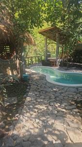 Bazén v ubytování Les Garden villa nebo v jeho okolí