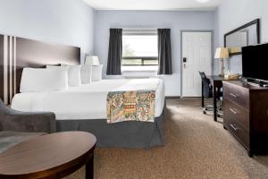 Voodi või voodid majutusasutuse SureStay Studio by Best Western Hardisty toas