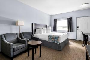Voodi või voodid majutusasutuse SureStay Studio by Best Western Hardisty toas
