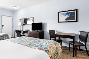 Voodi või voodid majutusasutuse SureStay Studio by Best Western Hardisty toas