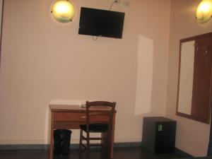 TV a/nebo společenská místnost v ubytování Serendipity + 31 fotografií