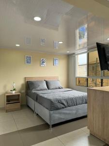 TV a/nebo společenská místnost v ubytování Hostelfc Chapinero