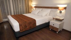 Ein Bett oder Betten in einem Zimmer der Unterkunft KanyonVadi Otel SAFRANBOLU-KARABÜK