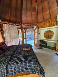 Postel nebo postele na pokoji v ubytování Les Garden villa