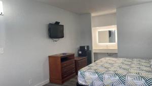 Ένα ή περισσότερα κρεβάτια σε δωμάτιο στο motel 6